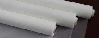 Three rolls of nylon filtering mesh.