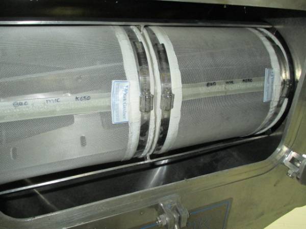 A centrifugal sifters with basket type nylon filter mesh.