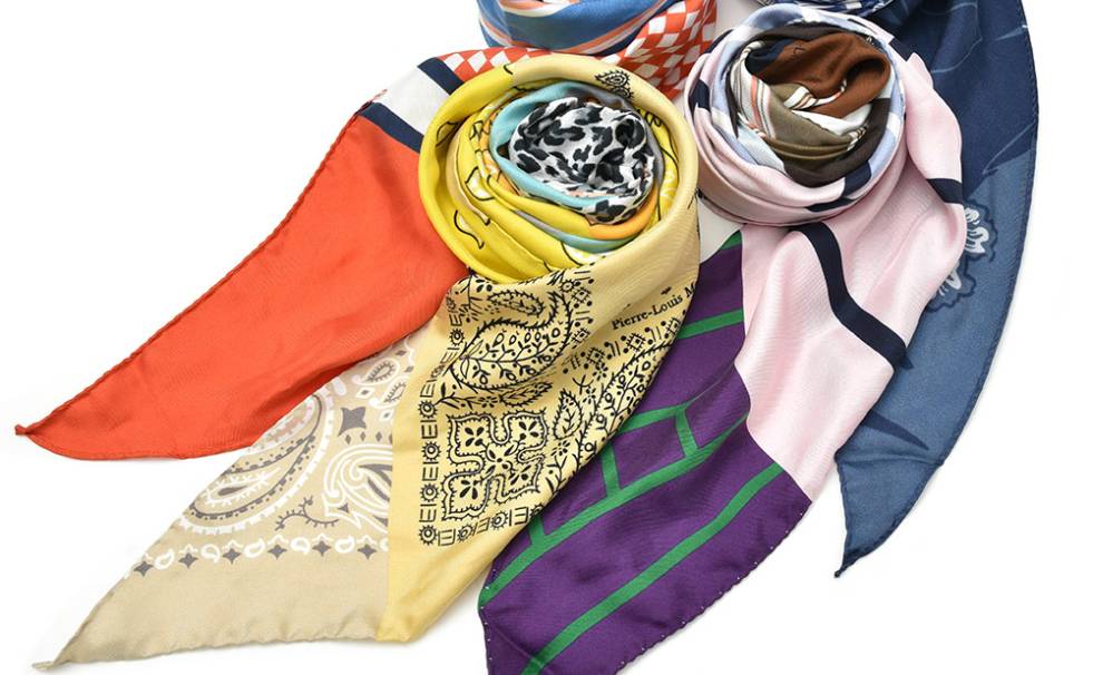 Four silk mufflers on the white background.